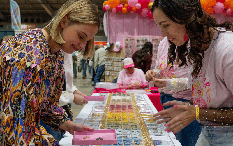 Blonde Woman shopping for Jewelry at Affair of the Heart