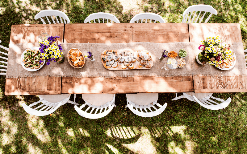 birds eye view of outdoor backyard pot luck picnic