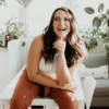 woman with brown hair laughing