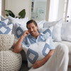 Craig Conover surrounded by many pillows