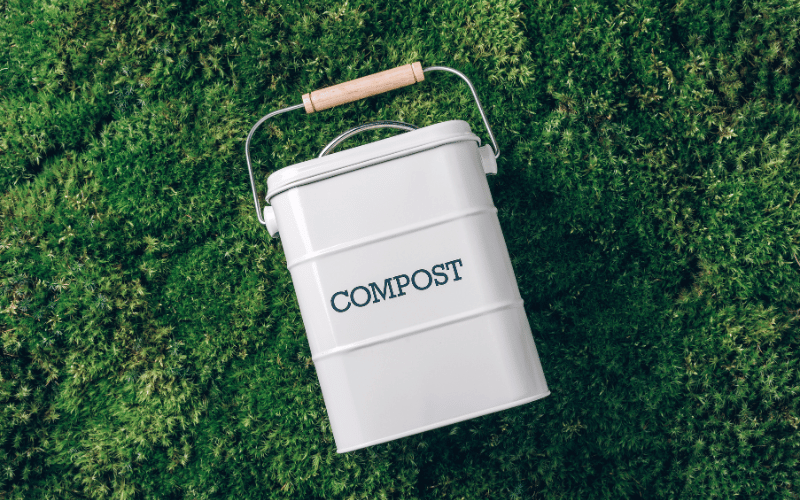 Big White compost Container laying down on grass