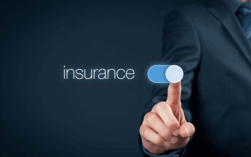 hand toggling on home insurance digitally