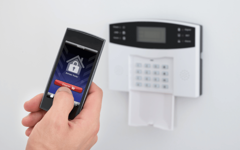 Disarming a home security system using mobile phone app 