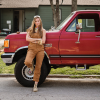 Kim Wolfe Brown Overalls Red Pickup Truck Thumbnail