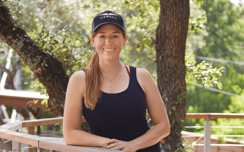 April Wilkerson smiling with arms crossed 