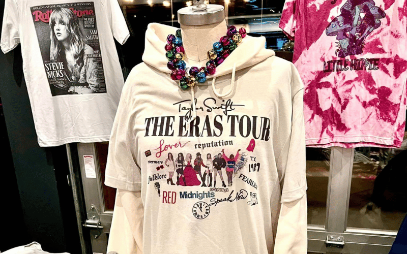 a mannequin styled with a cream tshirt and beaded necklace 