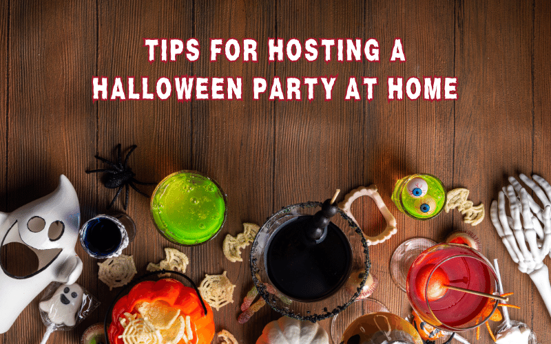 Wood panel background with ghosts, fake spiders, fake blood and other Halloween Decor on it with