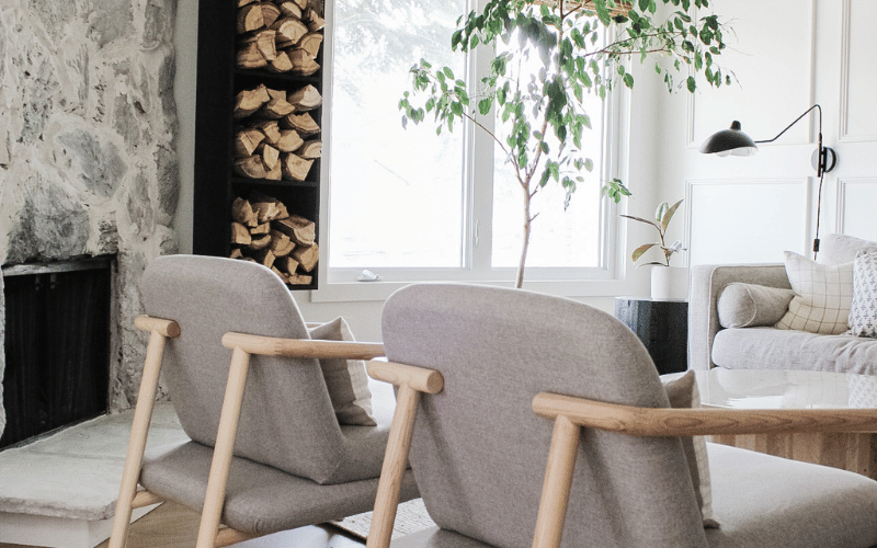 two large beige chairs in a living room