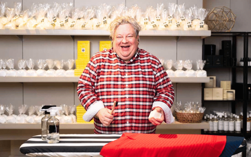 Patric Richardson next to an ironing board
