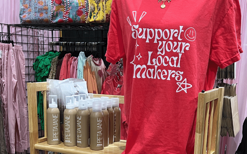 red graphic t-shirt and customized water bottles