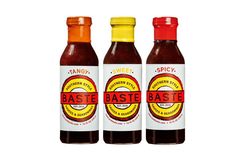 three bottles of barbecue sauce