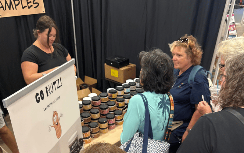 women shopping for jam at Braum's Affair of the Heart show 