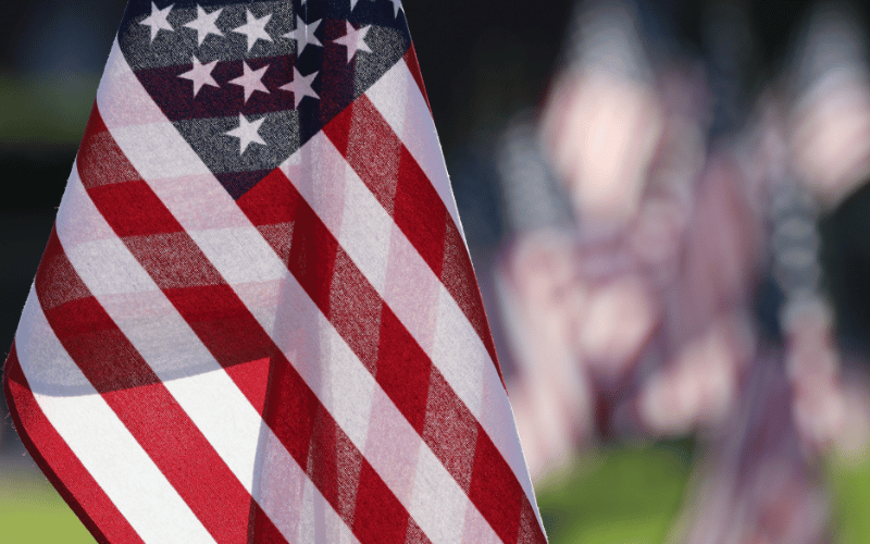 five American flags waving in the wind 