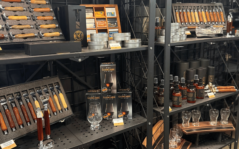 5 wooden cutlery and glasses on a display shelf