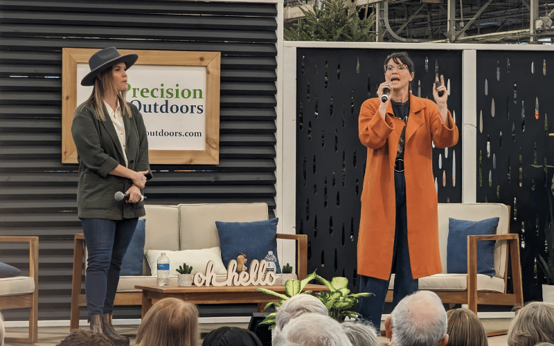 Lyndsay Lamb and Leslie Davis speaking on stage at the Indianapolis Home Show