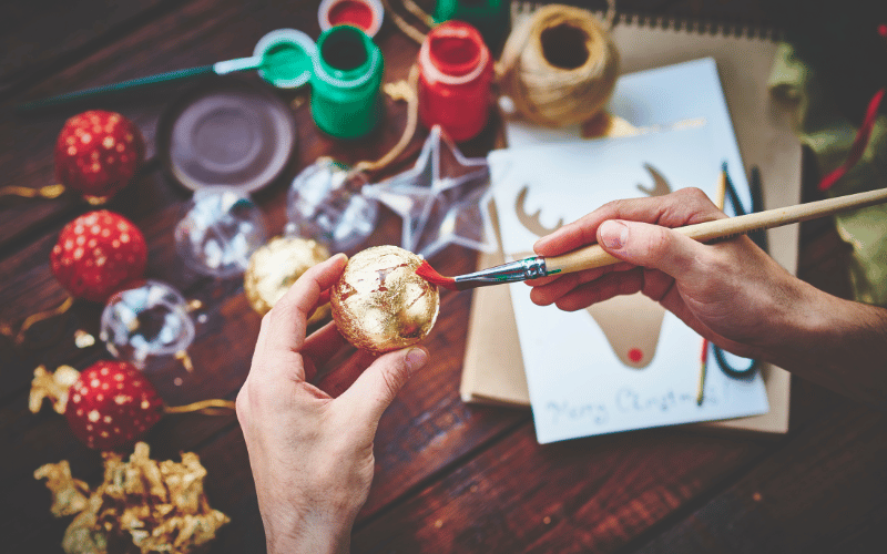 Hands painting custom Christmas Ornaments