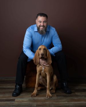 Dog trainer with hound