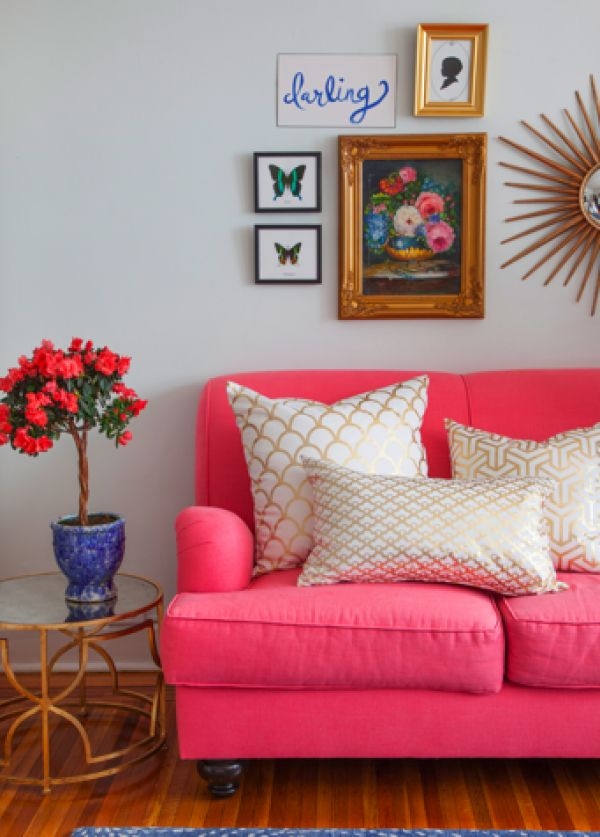 Living room with neon pink couch