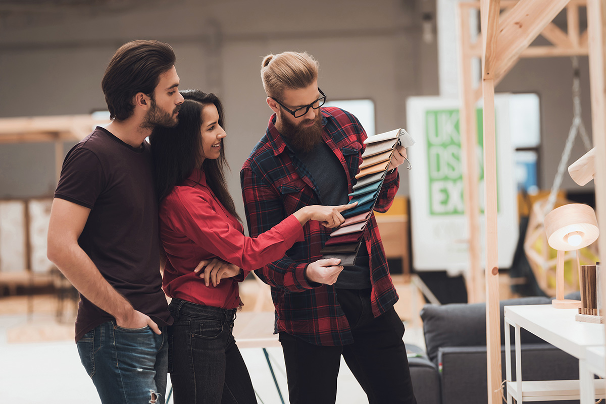 couple picking from colour swatches